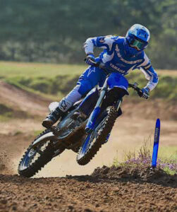offroad motorcycle going over a jump at an angle
